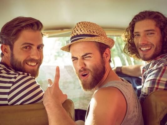 3 friends on a road trip on a summers day at Dream South Beach