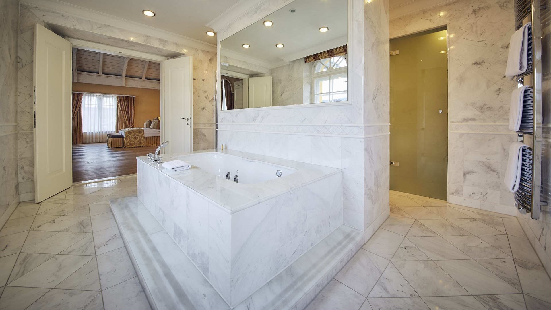 Marble bathtub in Romantik Suite at Falkensteiner Hotels