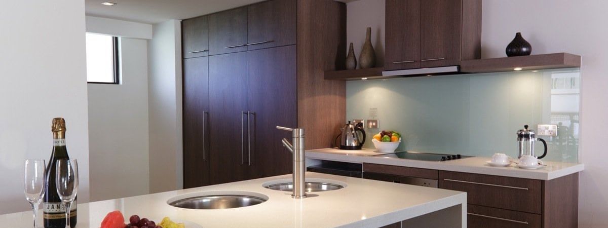 Kitchen in 3-bedroom at Pullman Palm Cove Sea Temple Resort
