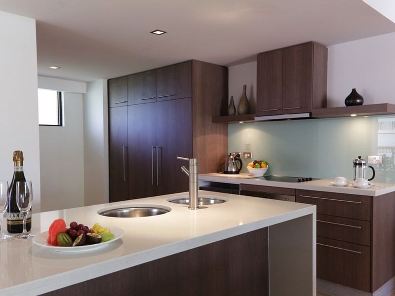 Kitchen in 3-bedroom at Pullman Palm Cove Sea Temple Resort