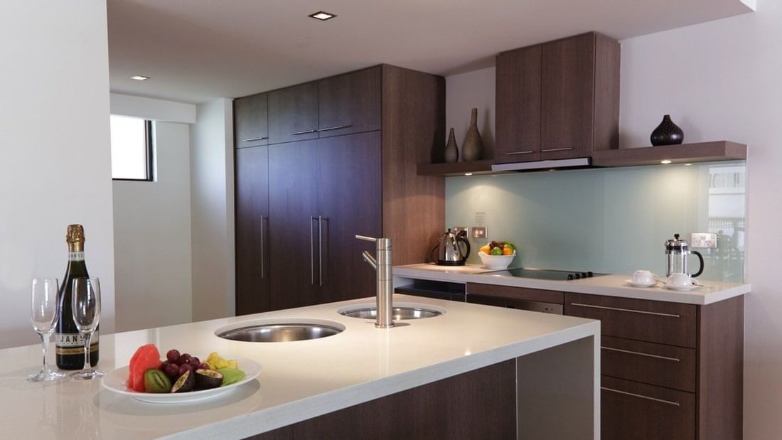 Kitchen in 3-bedroom at Pullman Palm Cove Sea Temple Resort