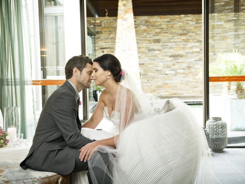 Wedded couple posing at Pullman Bunker Bay Resort