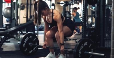 lady lifting weights at easthampstead park in berkshire