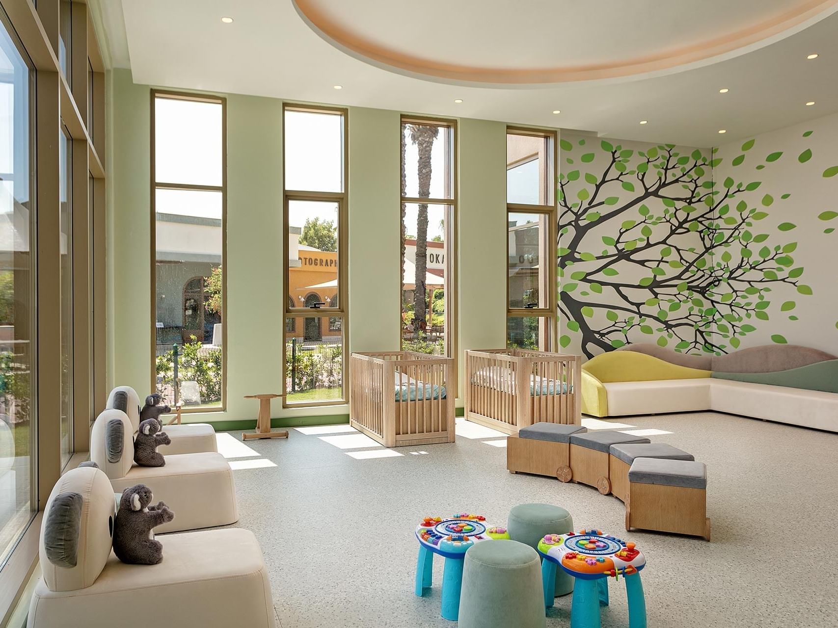 Indoor play area with playing stuffs in Kikoa Kids Club at Titanic Deluxe Lara