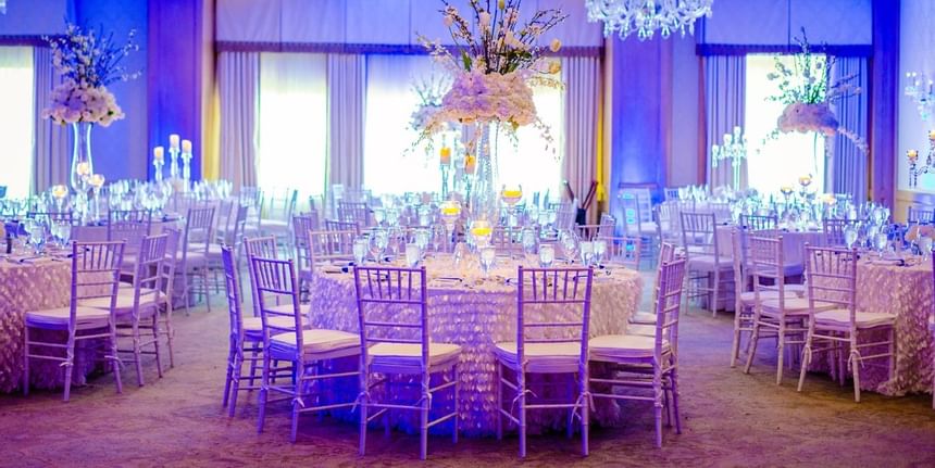 Banquet tables with decorations at a wedding at Townsend Hotel