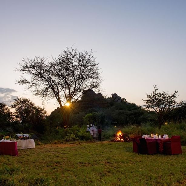 Tables arranged at Sundowners at Mbuzi Mawe Serena Camp