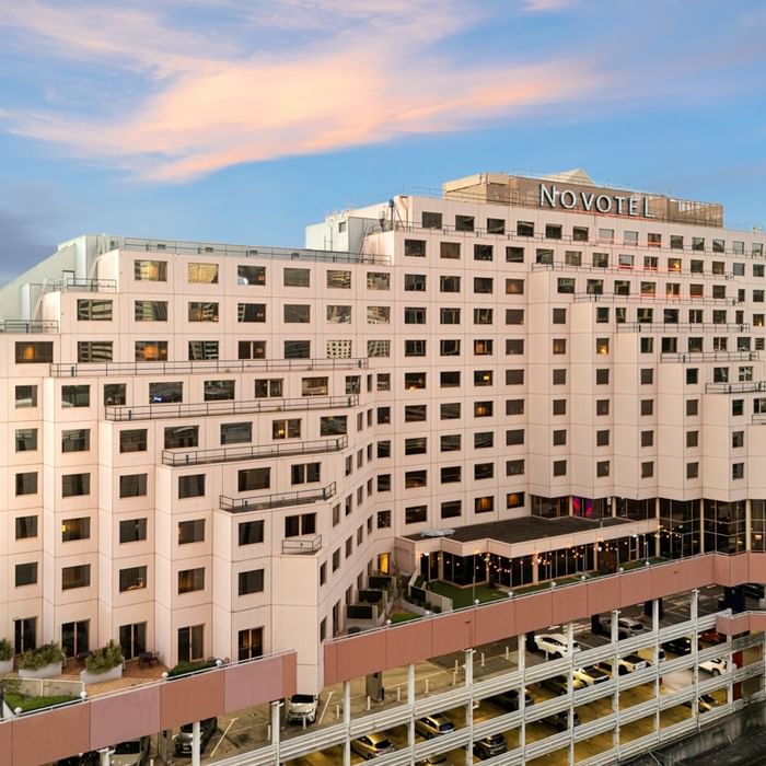 Hotel exterior at Novotel Sydney Darling Harbour featuring contemporary design, street-level access, and proximity to Sydney CBD attractions