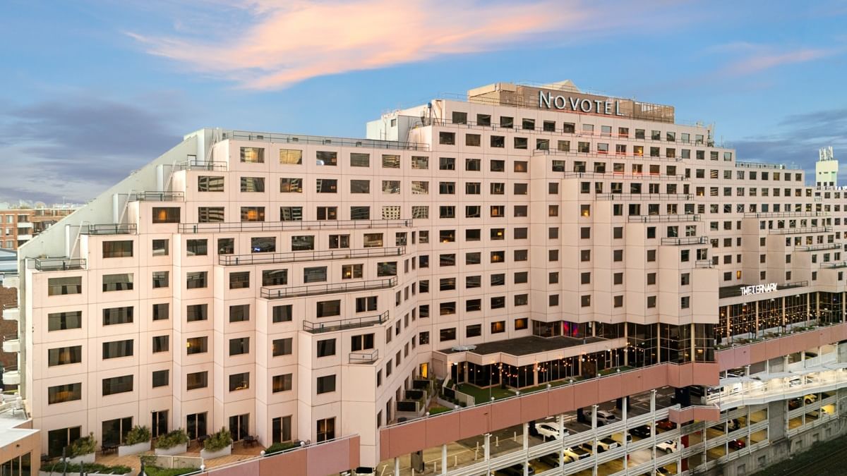 Hotel exterior at Novotel Sydney Darling Harbour featuring contemporary design, street-level access, and proximity to Sydney CBD attractions