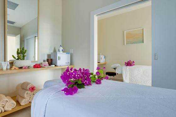 Spa room with vanity products in K'in Spa & Wellness Center at Alaia Belize Autograph Collection