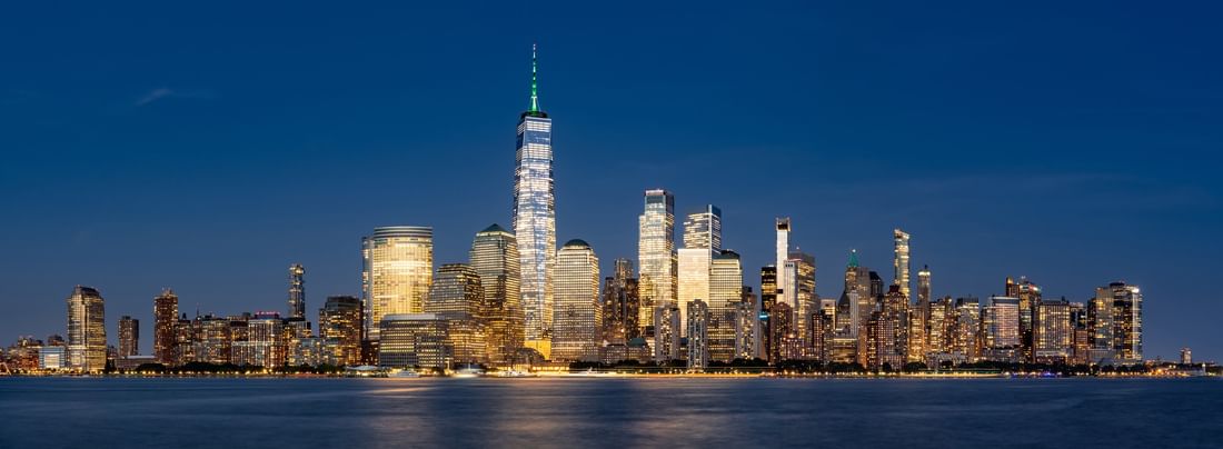 panoramic view of the Lower Manhattan skyline in New York City with water in foreground at Warwick New York