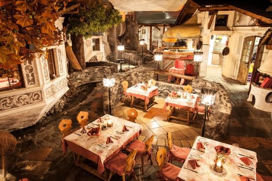 High-angle shot of Via Mala's dining area at Liebes Rot Flueh