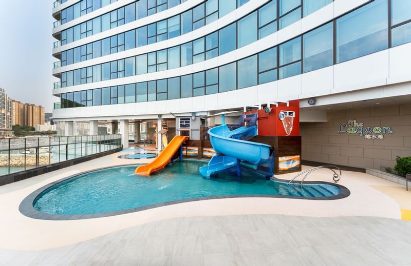 An outdoor kid's pool with slides in The Lagoon at Fullerton Ocean Park