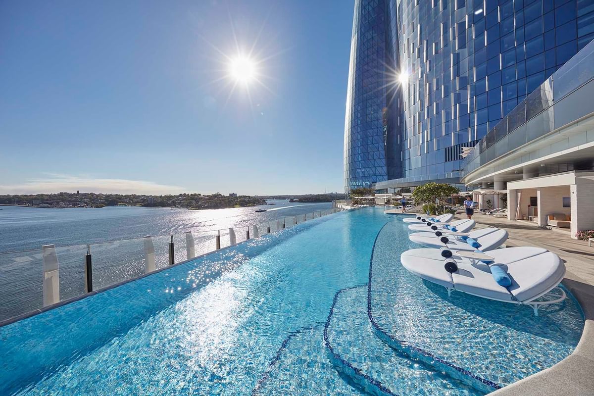 Pool with sun loungers at Crown Towers Sydney