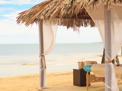 Ni Spa set up on a beach near the Copamarina Weddings