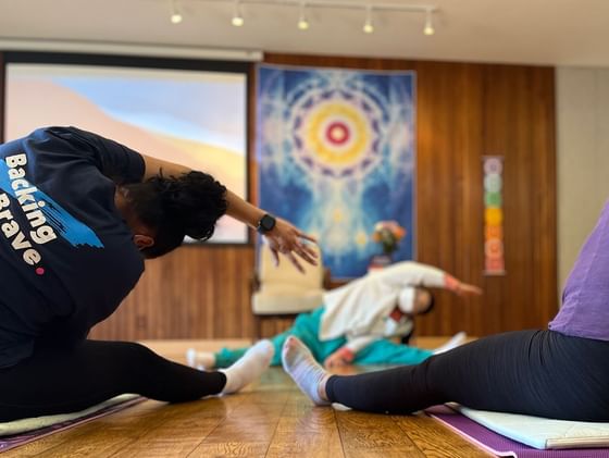 Women in an indoor exercise session at Honor’s Haven Retreat