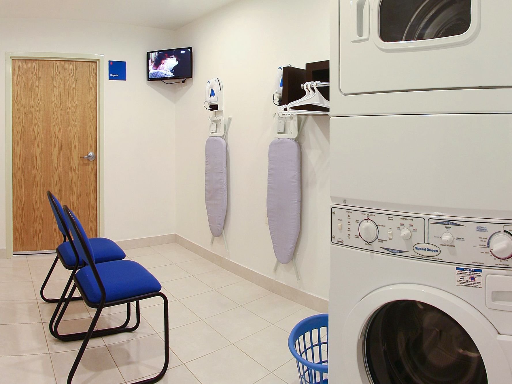 Washing machine, dryer & irons in Laundry Room at One Hotels