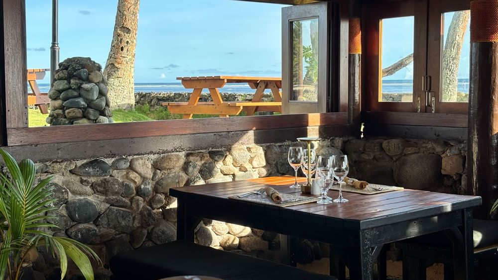 Dining area with ocean view at Wicked Walu in Korolevu at Warwick Fiji Resort and Spa.