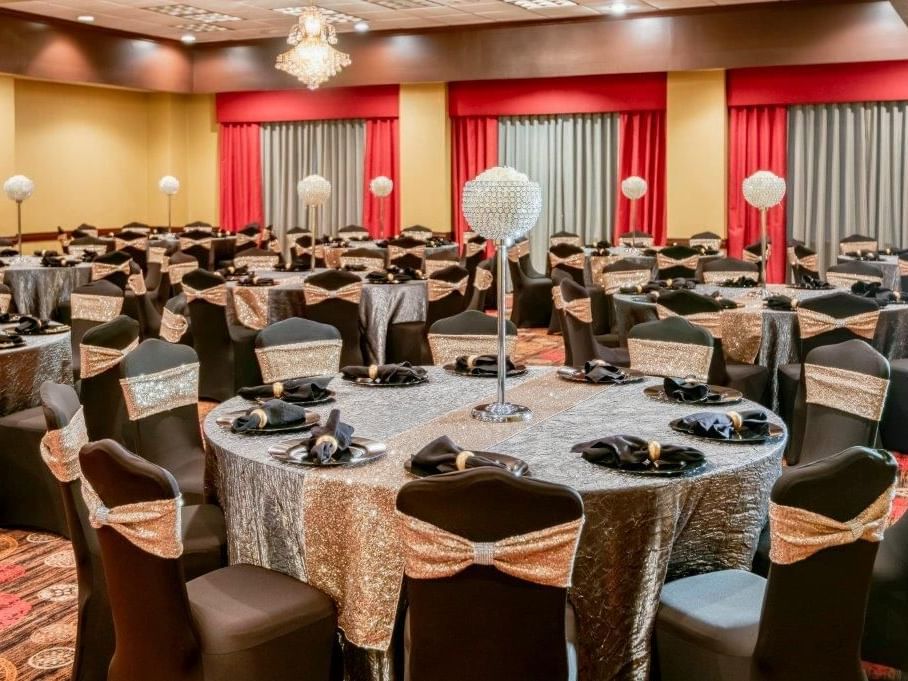 Banquet tables setup in Dallas Ballroom at MCM Elegante Suites