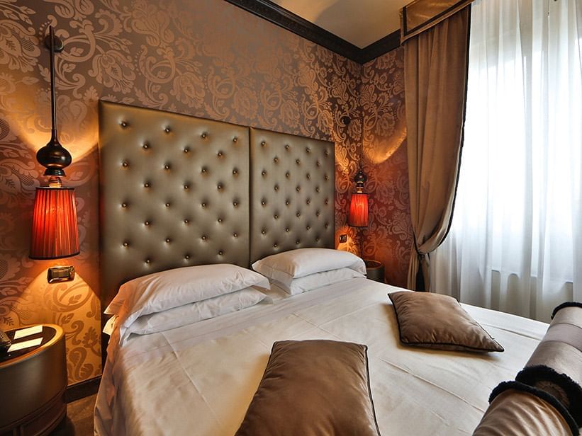 Interior of Suite with Bed & Furniture at Hotel Mozart