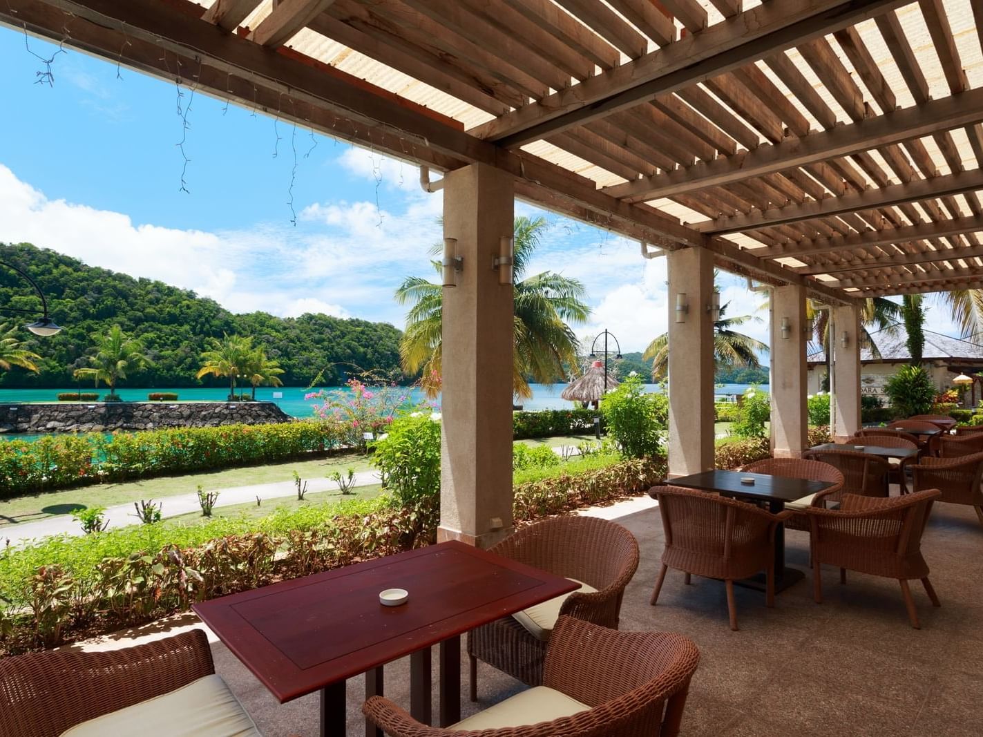 Outdoor dining in Waves Restaurant at Palau Royal Resort