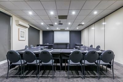 U-shaped table in Hawthorn Room at Amora Hotel Melbourne