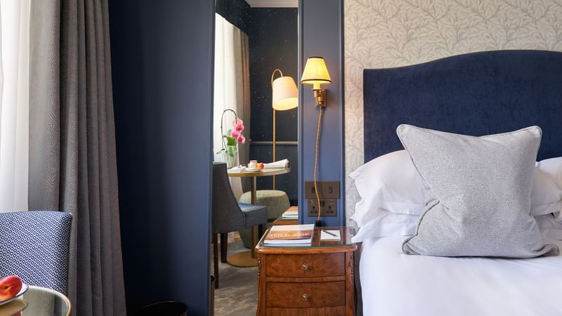 King bed with premium bedding & elegant decor in Classic Bedroom at The Capital Hotel London
