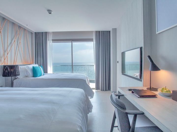 Elegant Ocean view room with twin beds at U Hotels