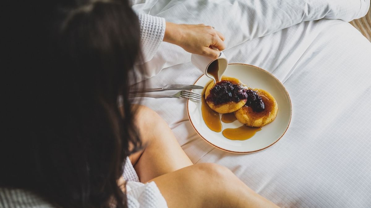 Closeup on a girl enjoying pancakes at May Fair Hotel London