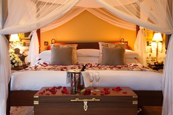 Kings bed in deluxe double tents at Hotel Lake Elmenteita