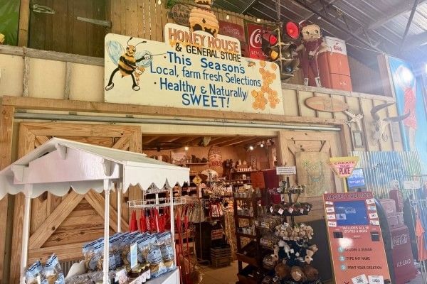 The entrance to a busy country shop with souvenirs, food goods, and toys at The Showcase of Citrus.