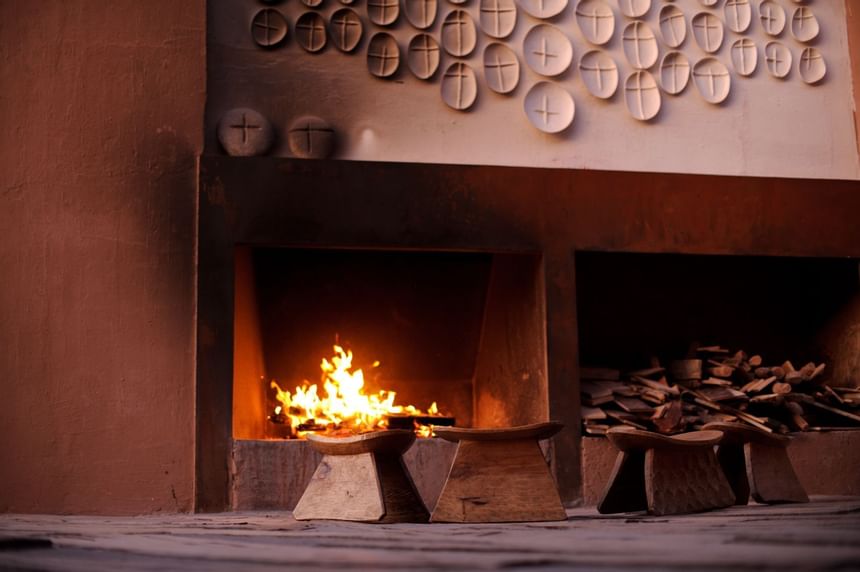 A fire place and setting area at NOI Casa Atacama Hotel 