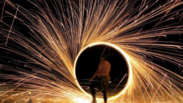 Fire eater performing at The Somerset On Grace Bay
