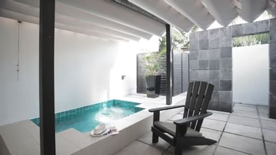 Chair by a plunge pool in Courtyard Suite at Amara Sanctuary