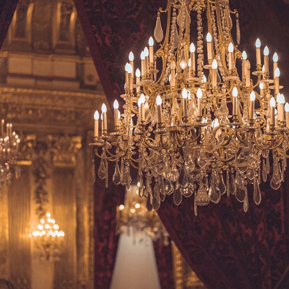 Candle-Style Chandelier in a Palace, Falkensteiner Hotels