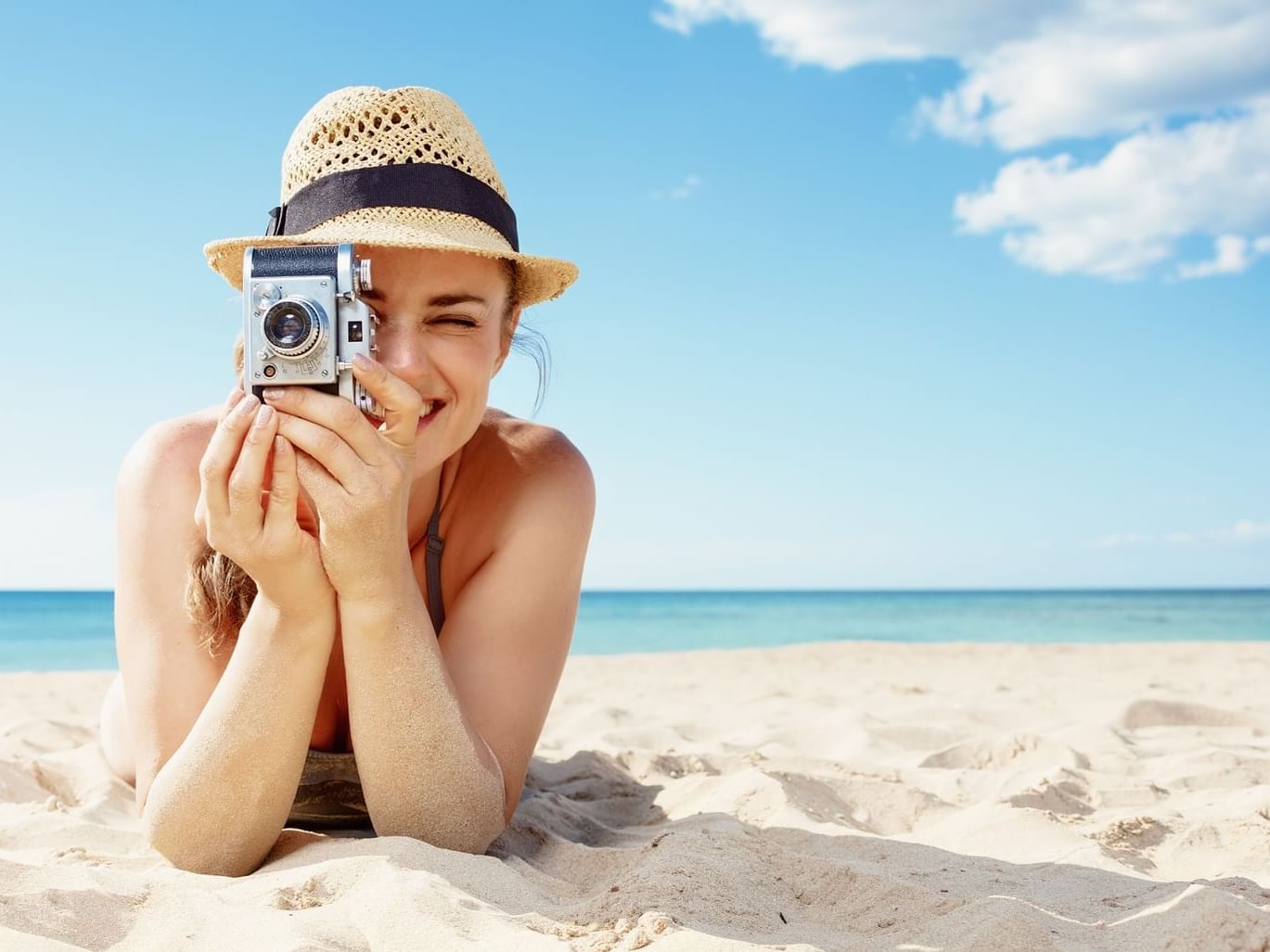 Lady capturing moments in the sea at Daydream Island Resort