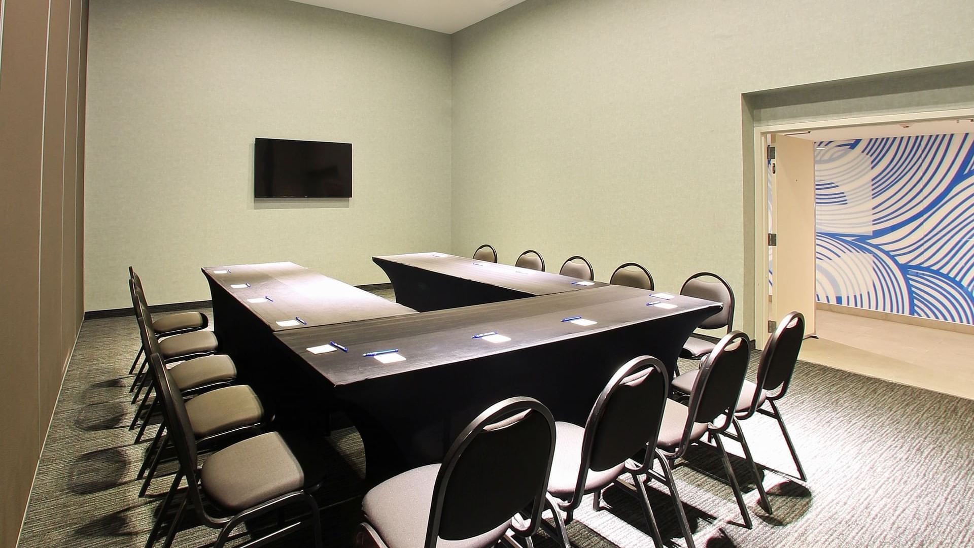 U-shaped table set up in the meeting room at One Cuautitlán