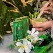 Close-up on spa amenities staged with plants at Palazzo Versace