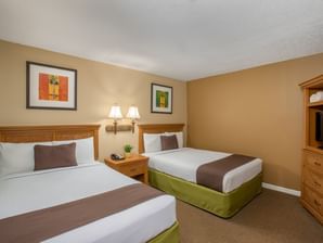 Twin beds in Remodeled Mini Suite at Legacy Vacation Resorts