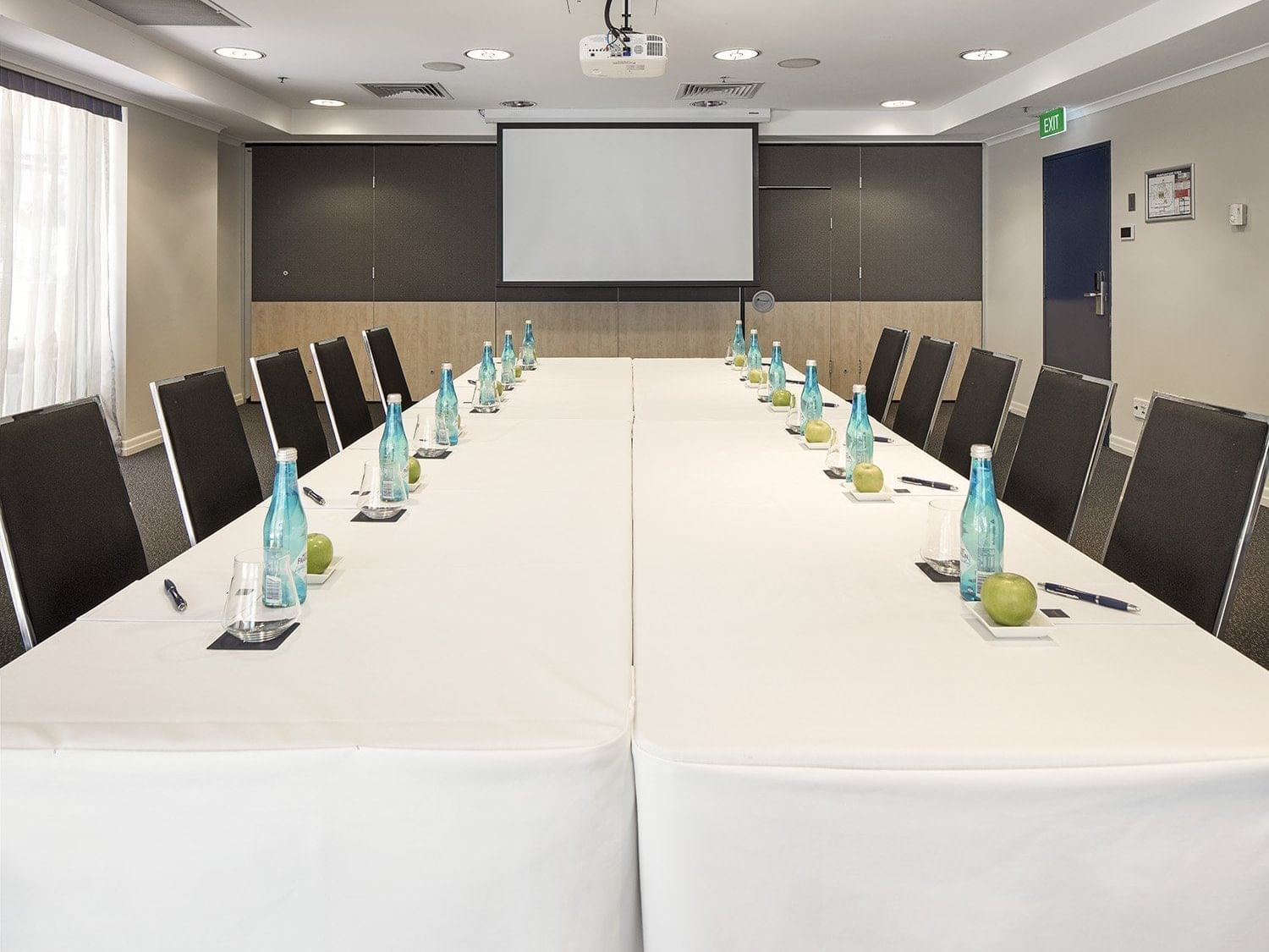 Properly arranged meeting room at Sebel Suites Brisbane