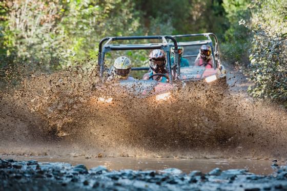 Cruising along rugged trails in RZRs near Adara Hotel