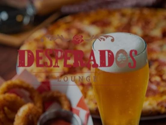 Pizza served with beer glass in Desperados at Fairmont Hot Springs Resort