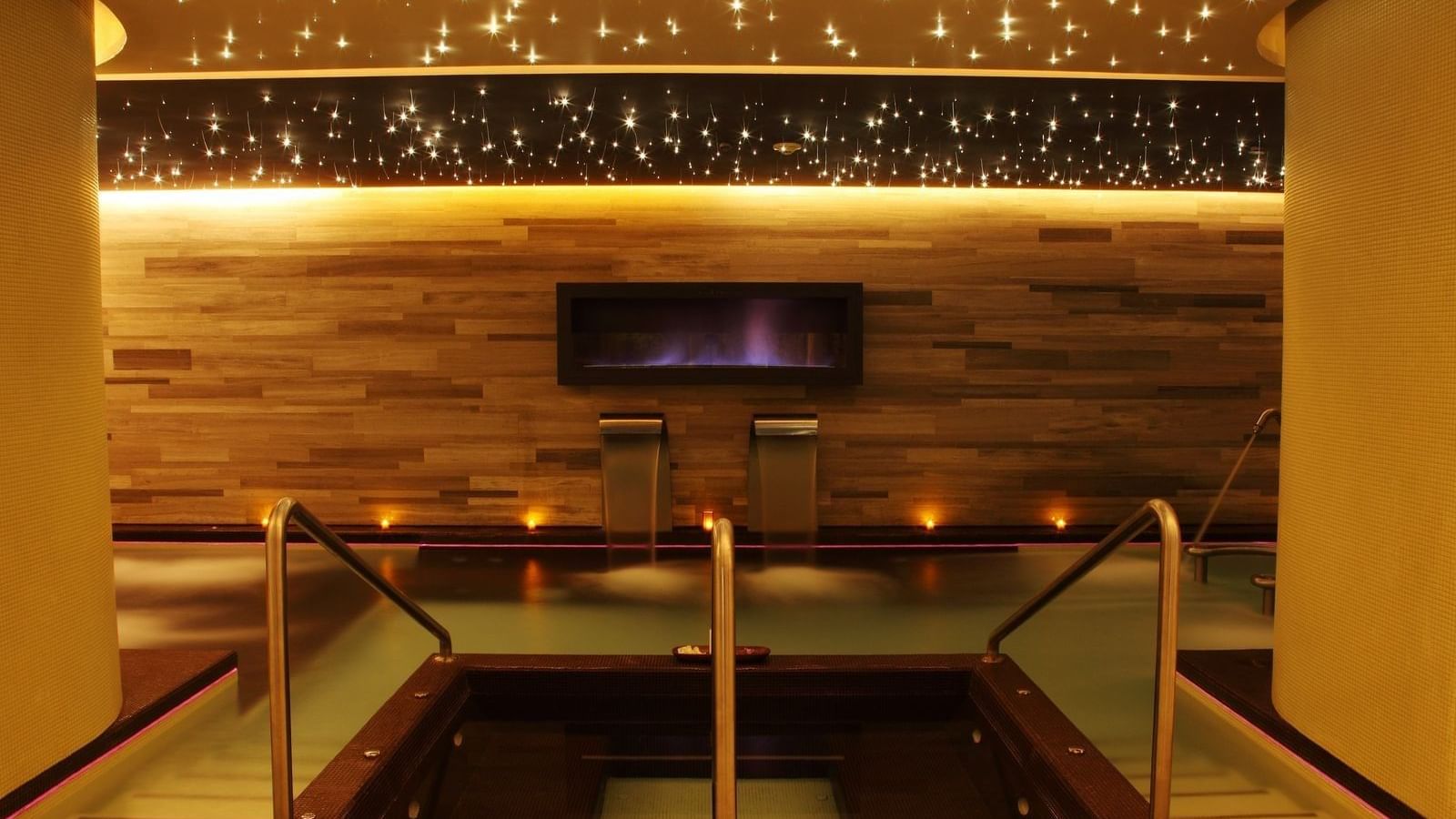An indoor pool area in the Urban Spa at Live Aqua Resorts
