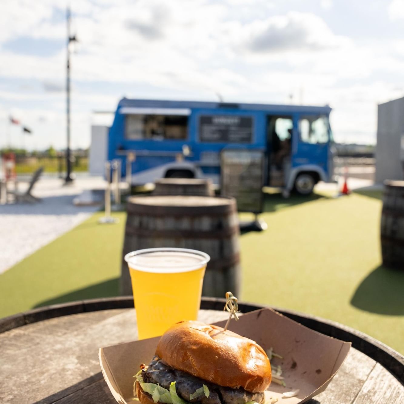 Beer & burger on a barrel by the food truck in Beer Garden at The Artisan Hotel at Tuscan Village