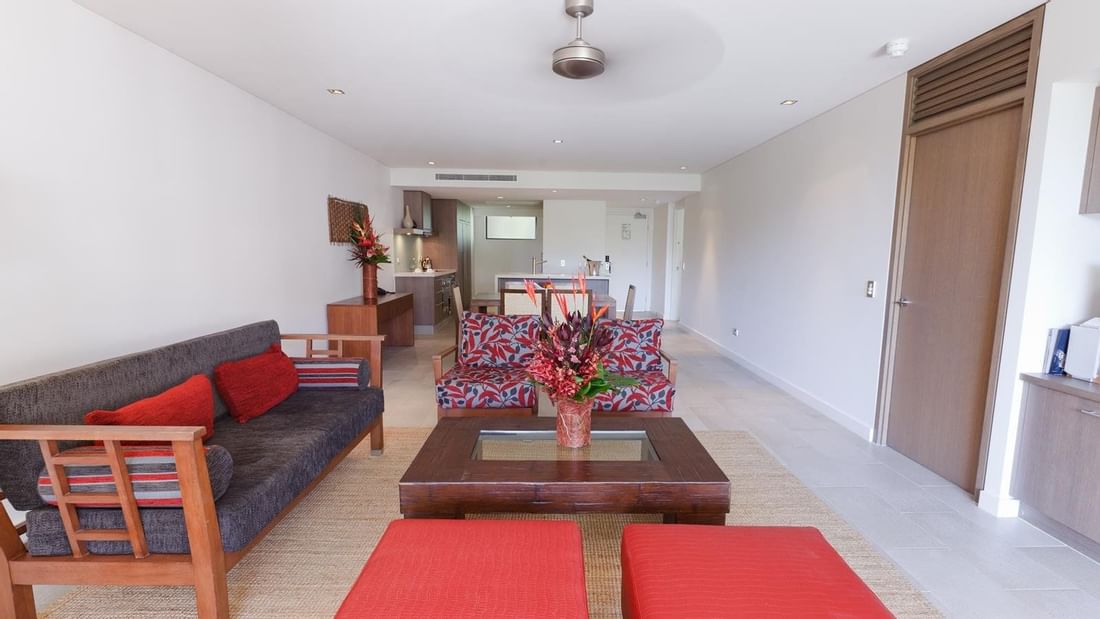 Living area in 2-bedroom at Pullman Palm Cove Sea Temple Resort
