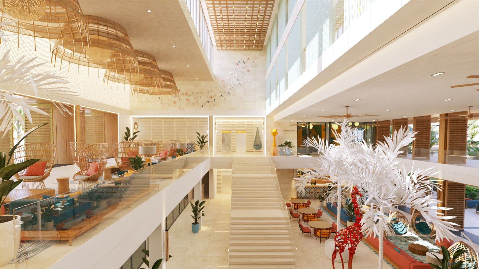 Gran atrio de varios niveles en Fiesta Americana Funeeq Punta Cana con decoración de palmeras blancas y sillones elegantes