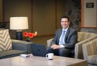 Coast Canmore Hotel & Conference Centre - Business Man in Lobby(1)