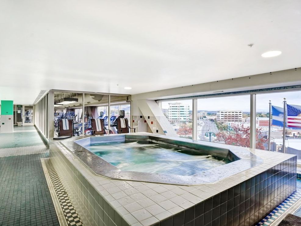 An indoor hot tub in Fitness Club & Spa at The Grove Hotel