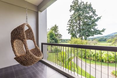 Balcony in Deluxe Mountain View Room at Chatrium Golf Resort