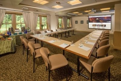 Large meeting room with U-shaped tables