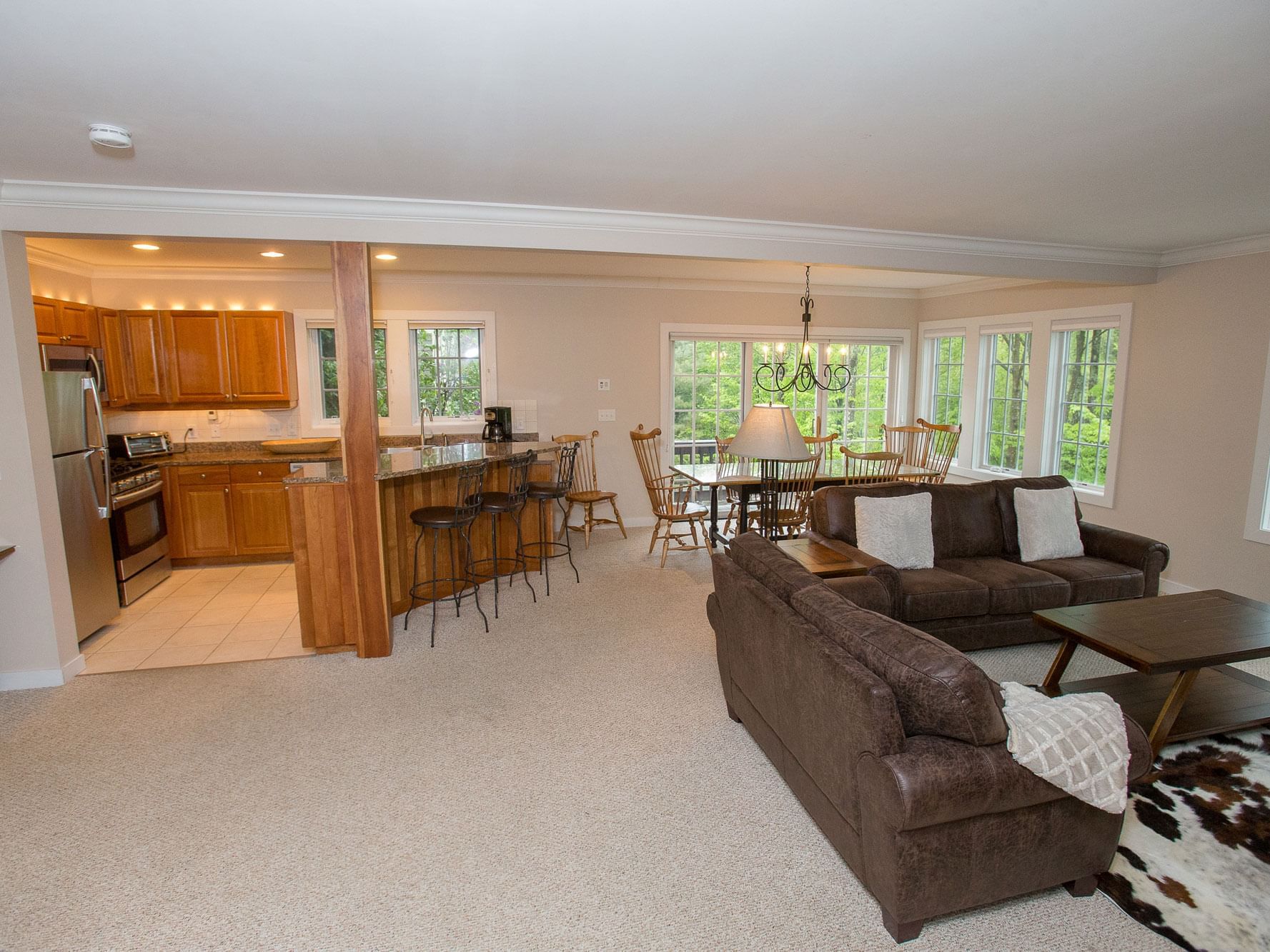 Living area, dining area and pantry area in the Resort Home 571A at Topnotch Stowe Resort